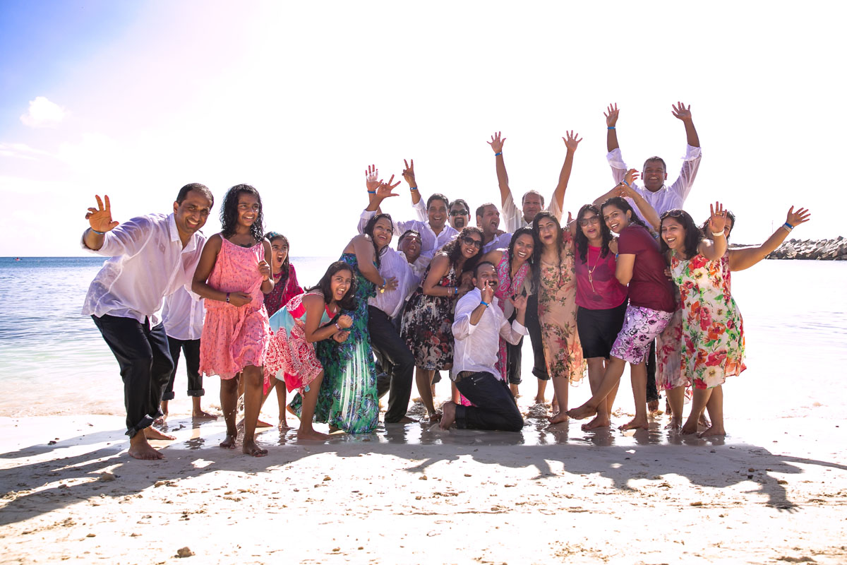 Family cheers at Cid Beach photo session