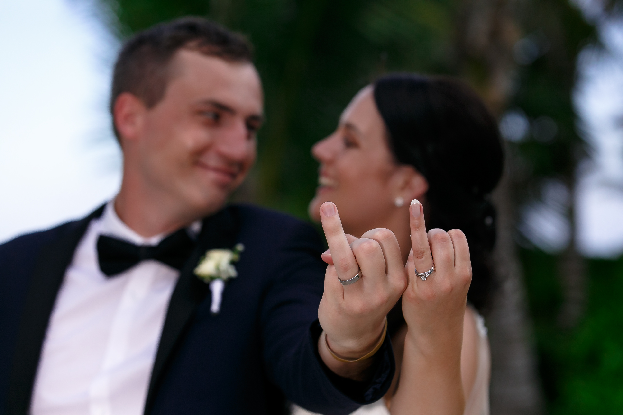 Newlyweds show off their new wedding rings at Grand Sirenis wedding