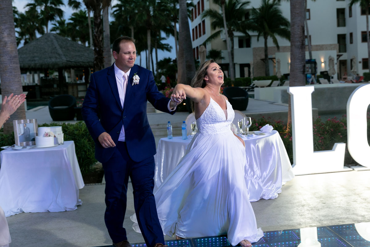 Newlyweds enter reception dancing