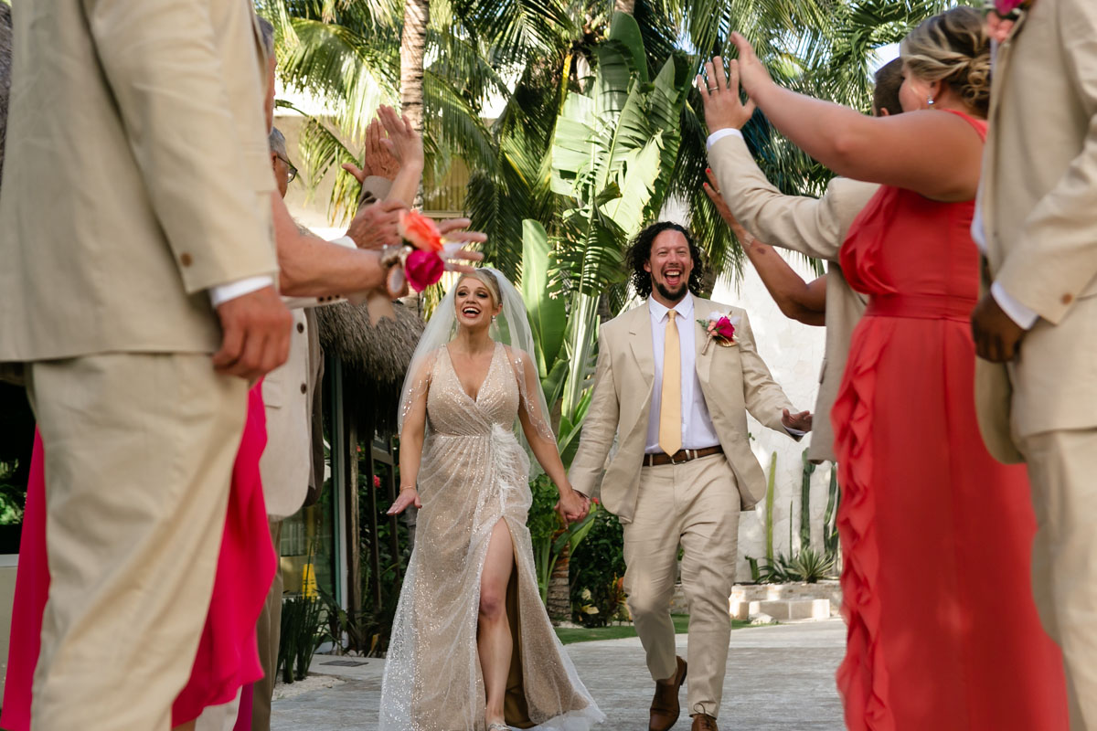 Newlyweds walk gauntlet of high-fives!