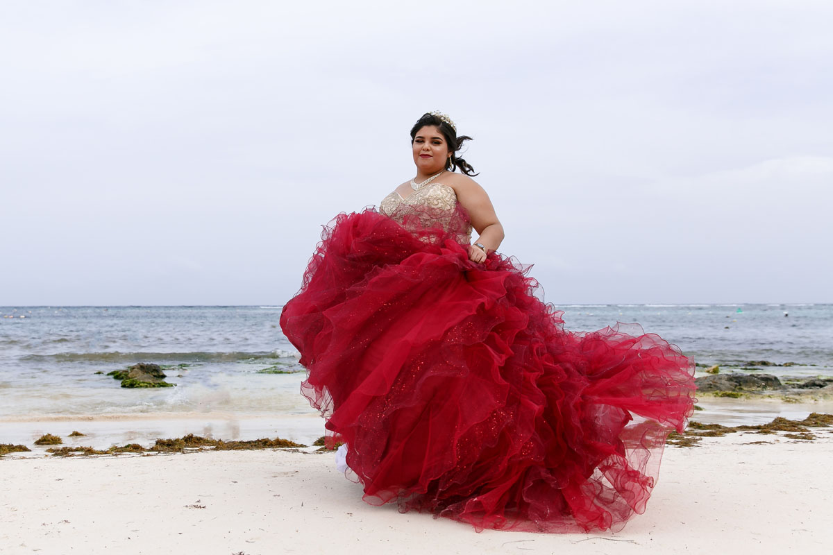 AkumalQuinceaneraLisiTwirlingGownOnBeach