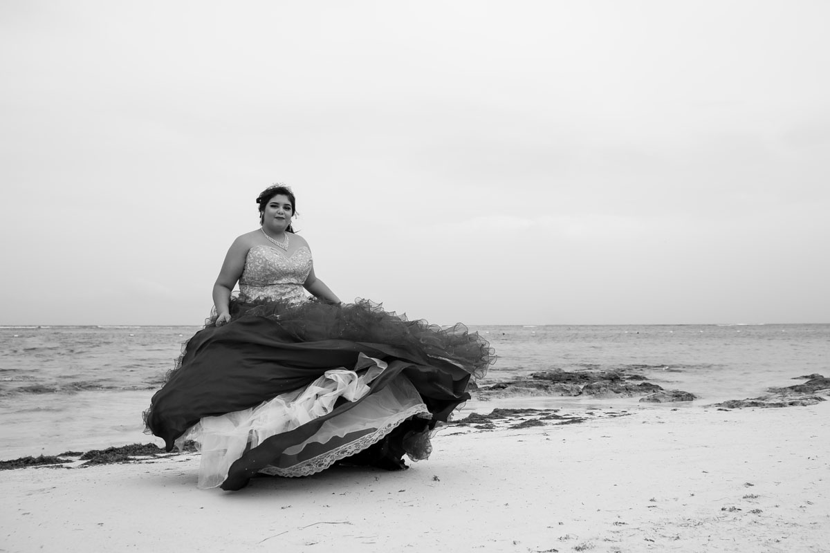 AkumalQuinceaneraLisiTwirlingGownOnBeach
