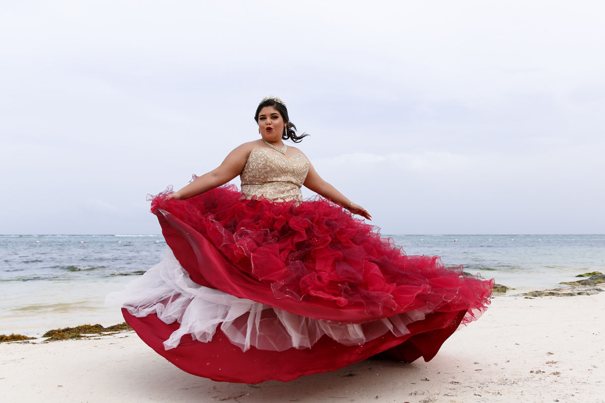 AkumalQuinceaneraLisiTwirlingGownOnBeach