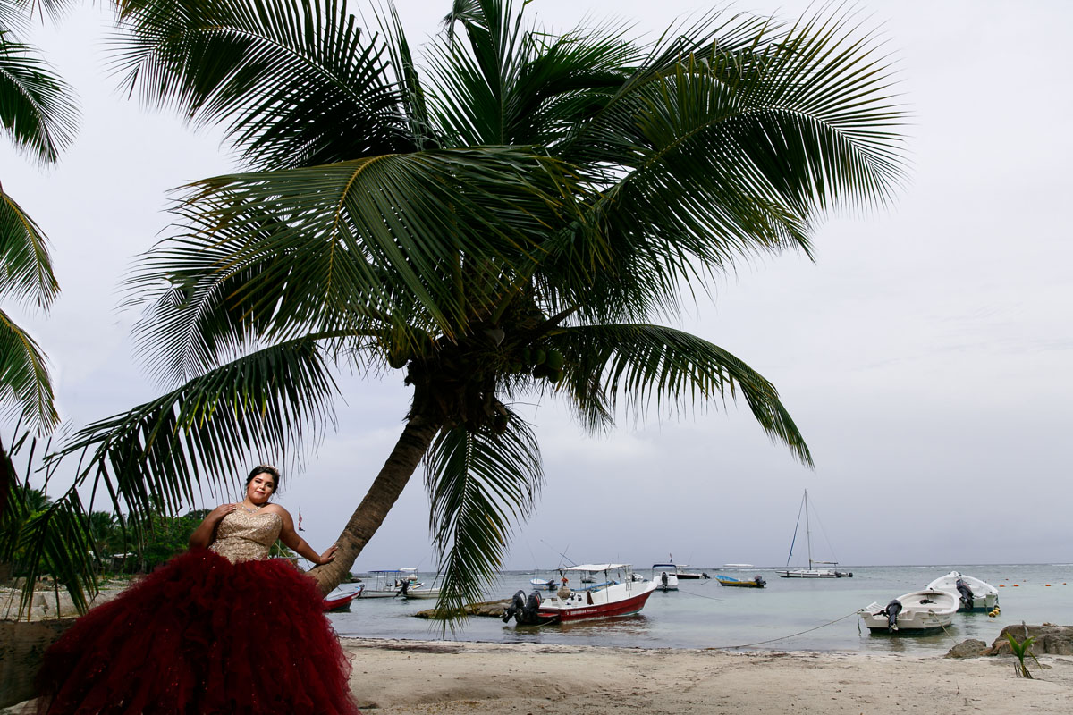 LisiLeaningOnBeachPalmTree