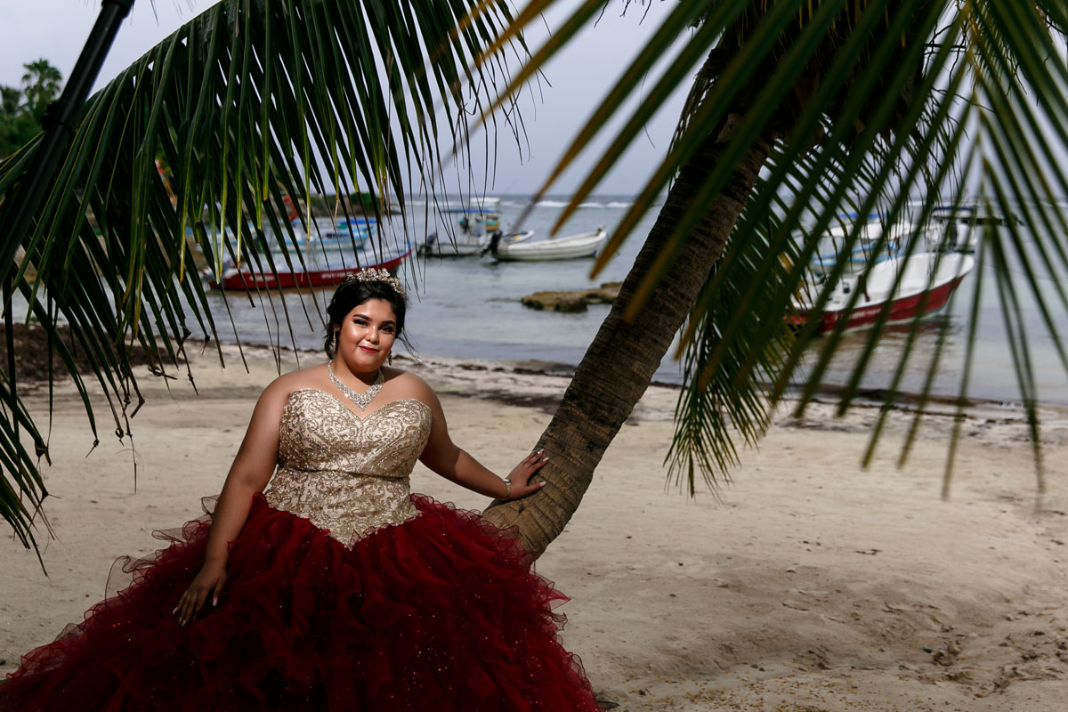 LisiLeaningOnBeachPalmTree