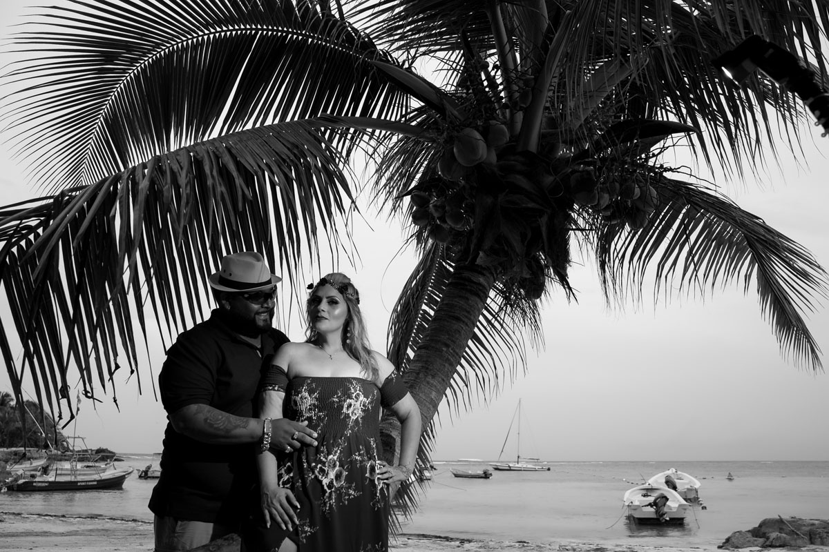 ParentsLeaningOnBeachPalmTree