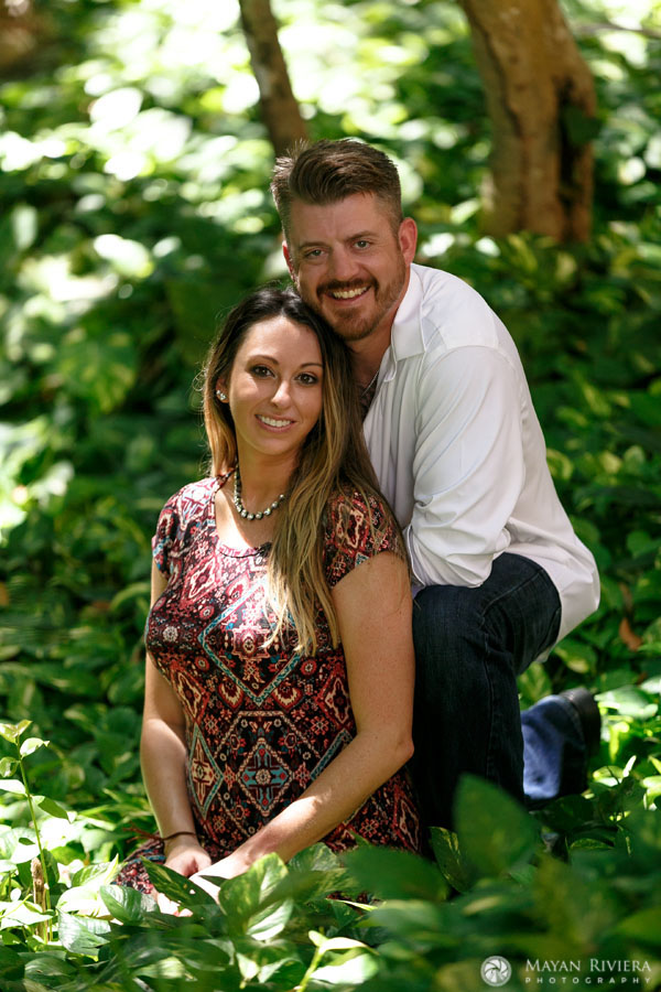 ExpectantParentsSnuggleInJungle