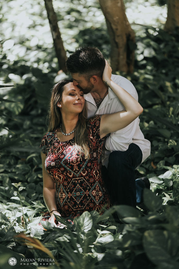 ExpectantParentsSnuggleInJungle