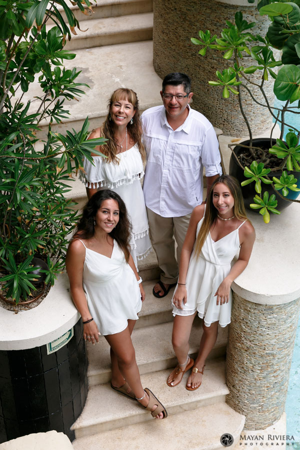 JenniferAndFamilySmileUpAtCamera