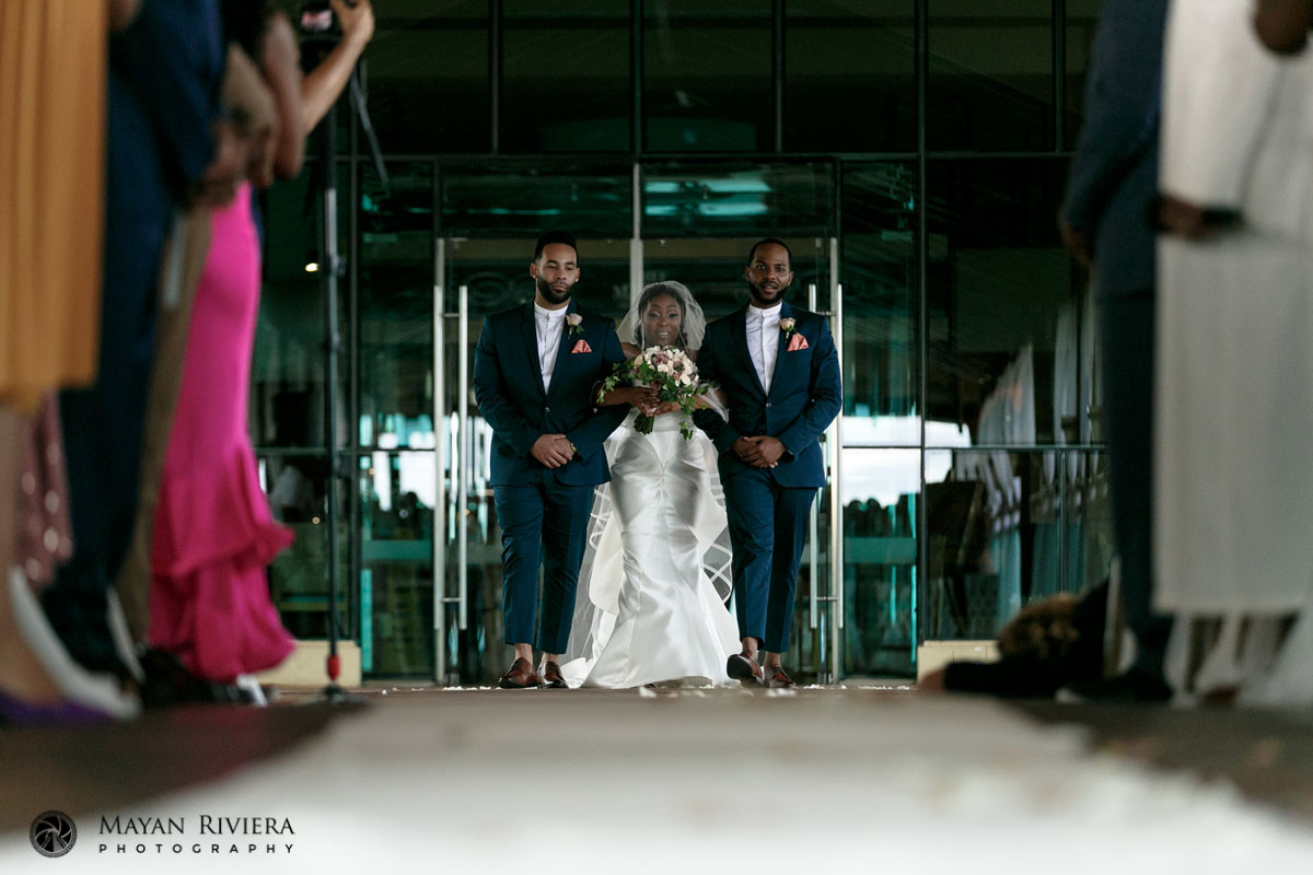 BrideWalkingInWithTwoEscorts