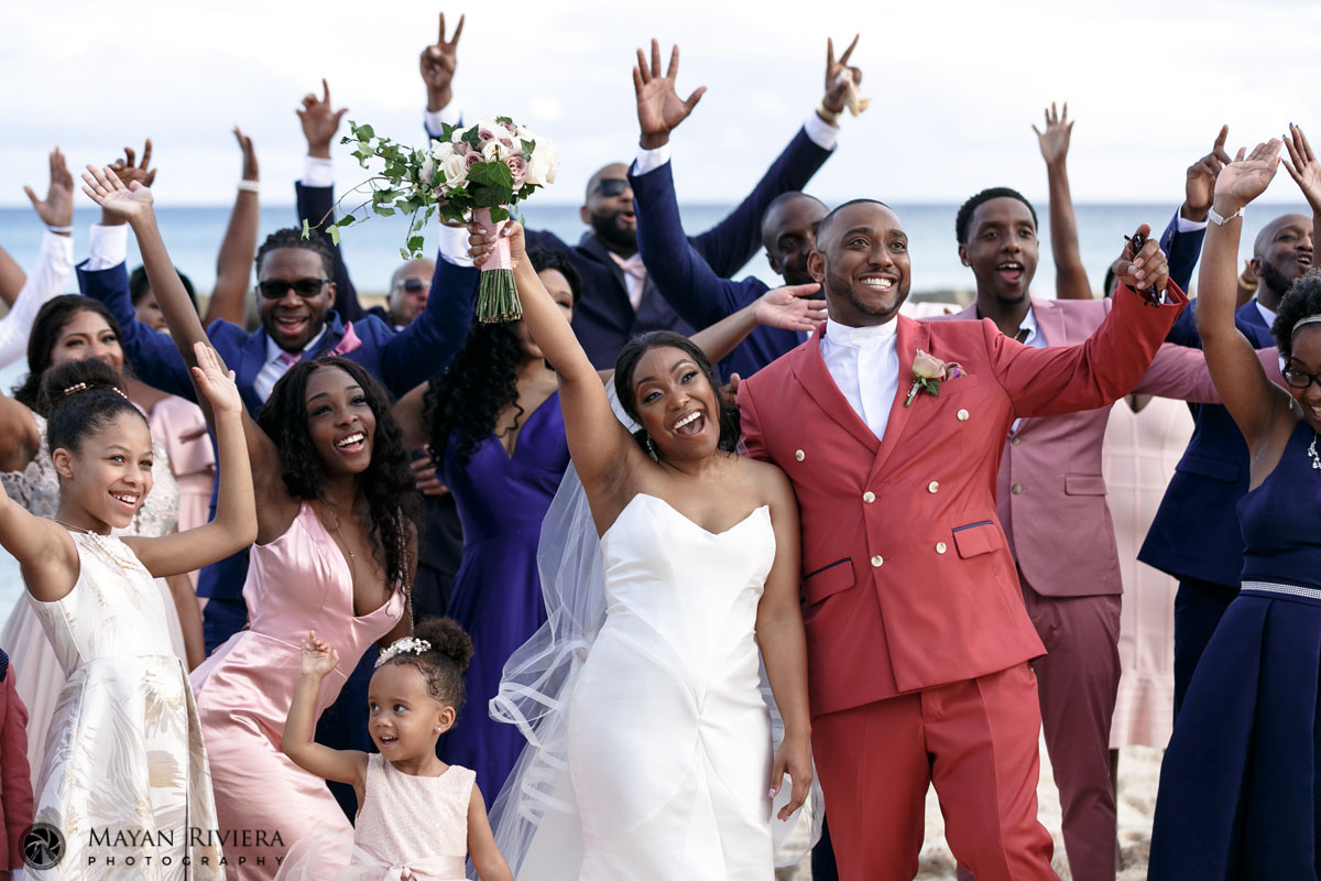DroneShotOfWeddingGuestsCheeringNewlyweds