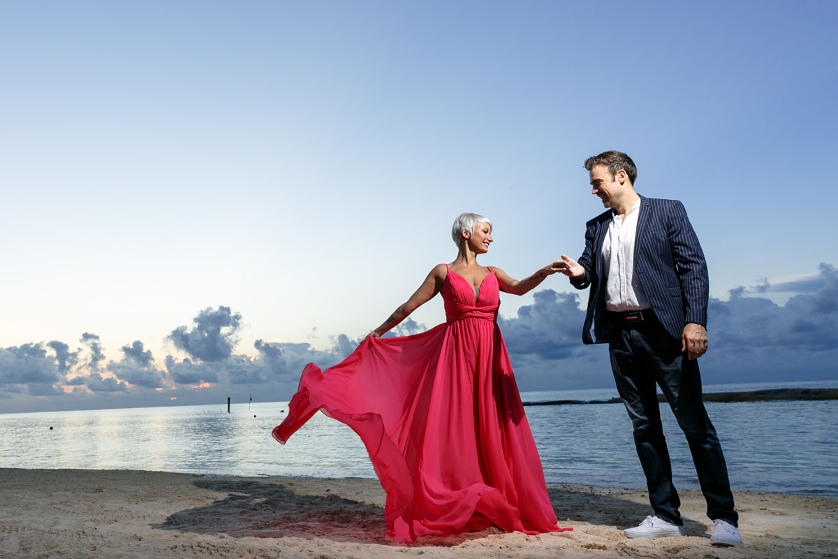 CoupleDanceOnBeachAtSunrise
