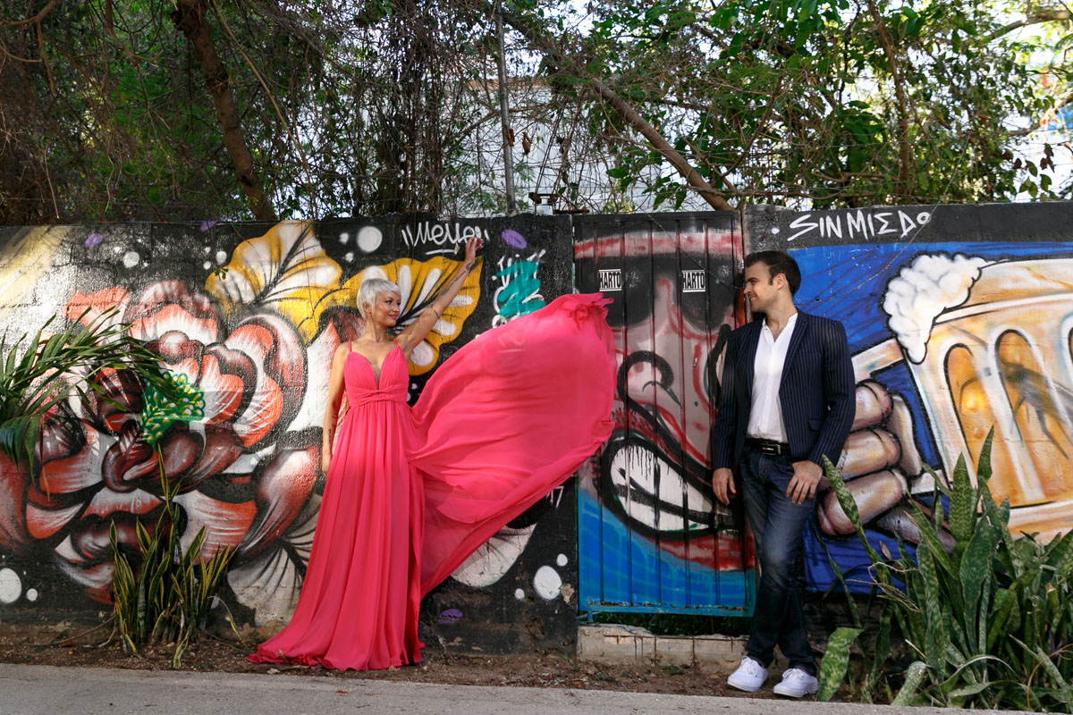 GitaFlingsDressByWallWithAlan