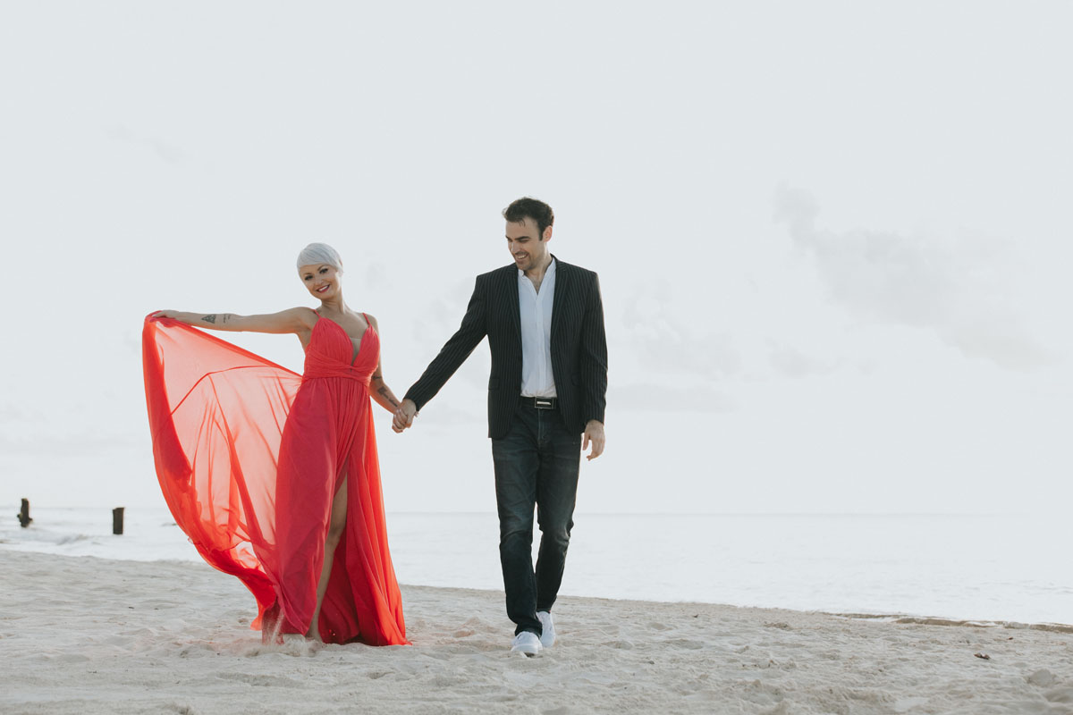 CoupleStrollOnBeach