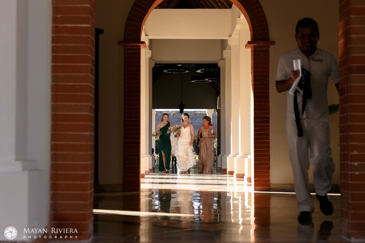 BrideAndAttendantsWalkingToCeremony