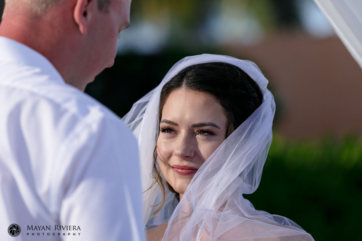 BrideSmilesAtGroom