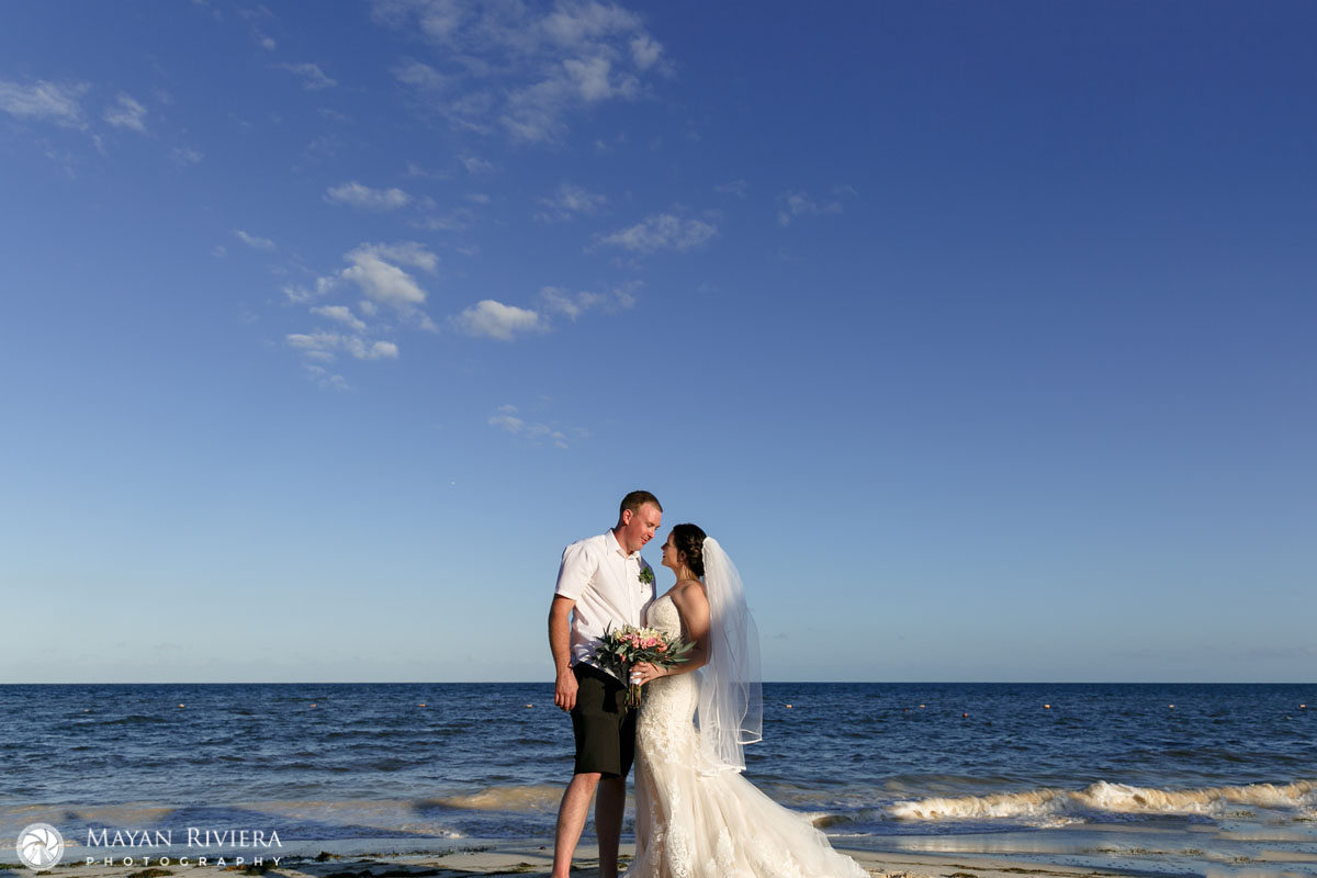 NewlywedsPoseOnBeach