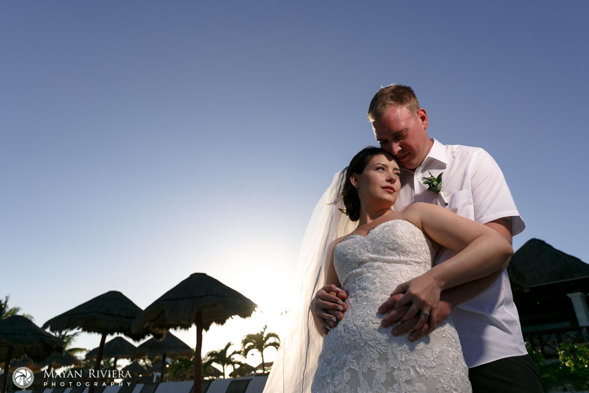 NewlywedsPoseOnBeach