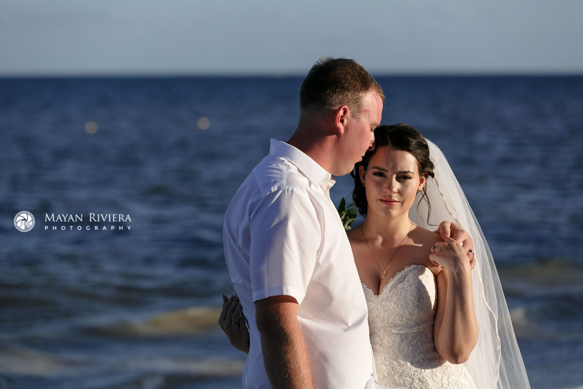 NewlywedsPoseOnBeach