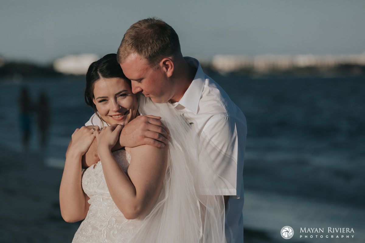 NewlywedsPoseOnBeach