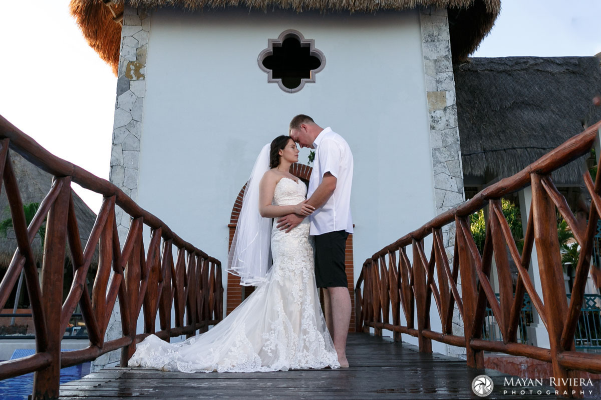 NewlywedsPoseOnRailBridge