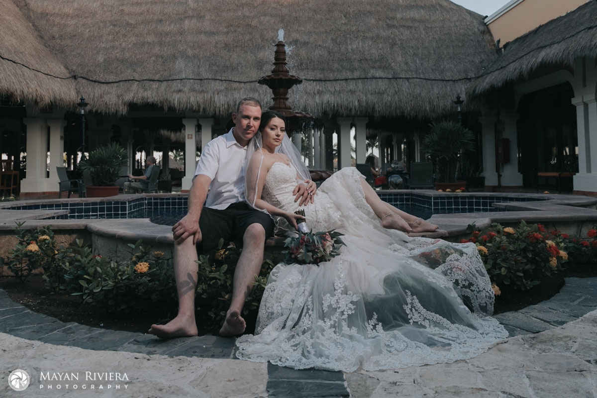 NewlywedsreclineOnFountainLedge