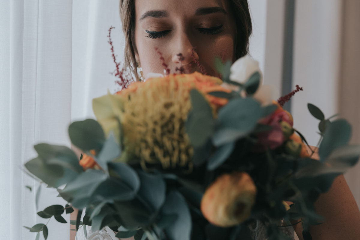 OceanRivieraParadiseBrideInhalesBouquet