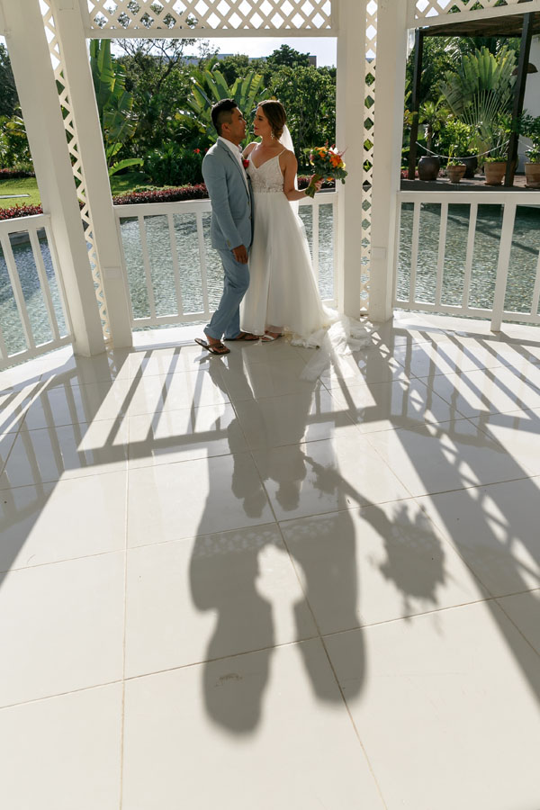 FirstLookWeddingCoupleSmileAtEachOther