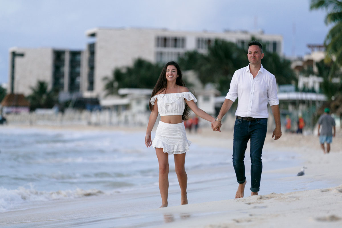 NewlyEngagedCoupleOnPdCBeachWalk