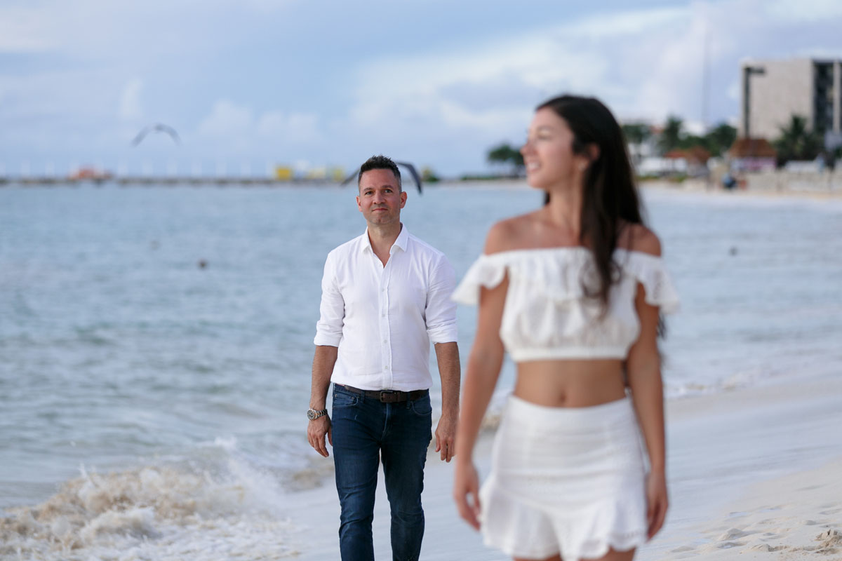 NewlyEngagedCoupleOnPdCBeachWalk