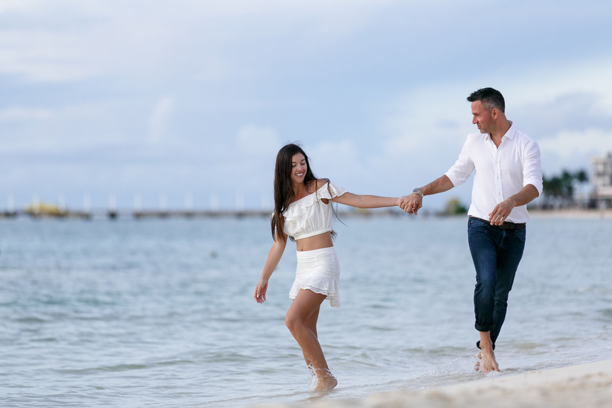 NewlyEngagedCoupleDanceOnPdCBeach