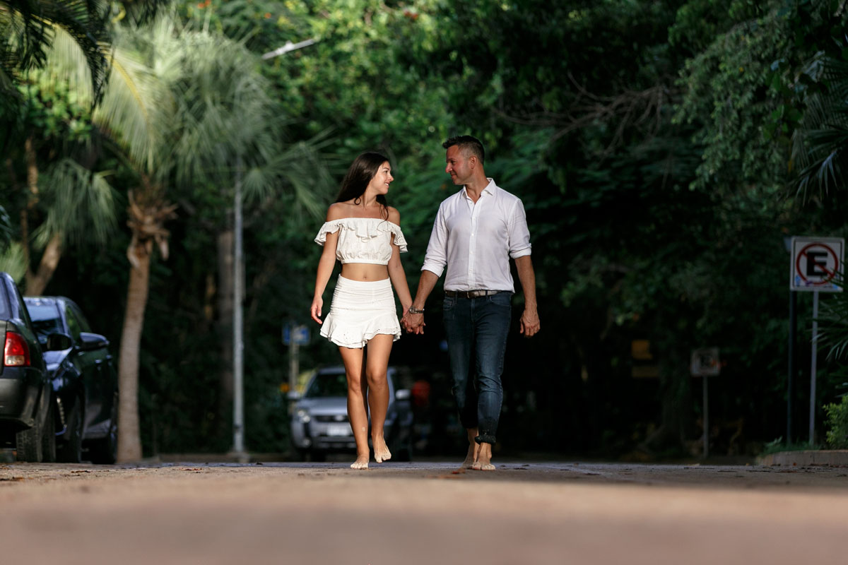 NewlyEngagedCoupleStrollingOnCitySideWalk