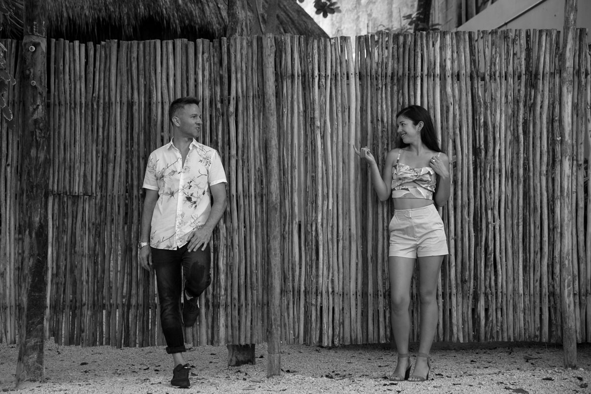 NewlyEngagedCoupleStandByReedWall