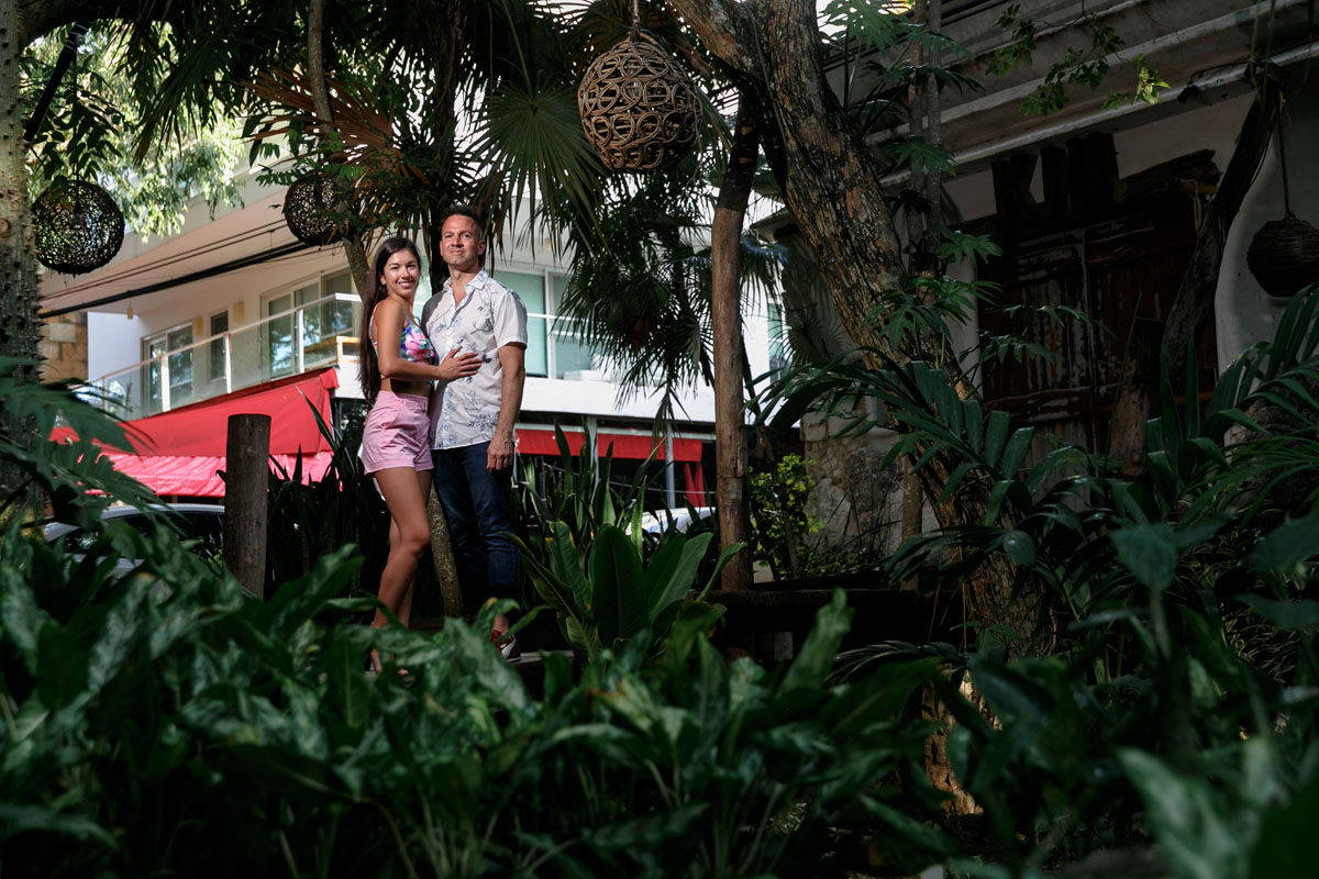 NewlyEngagedCouplePoseByRestaurant