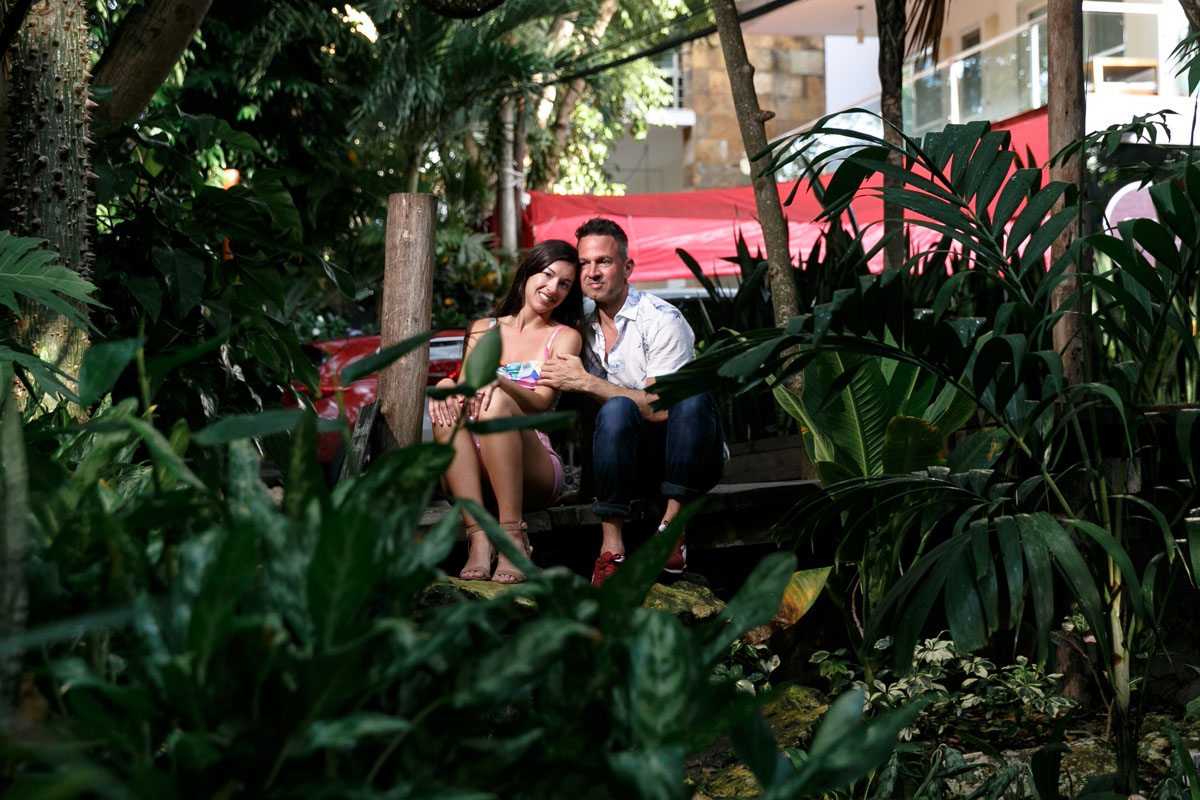 NewlyEngagedCouplePoseByRestaurant