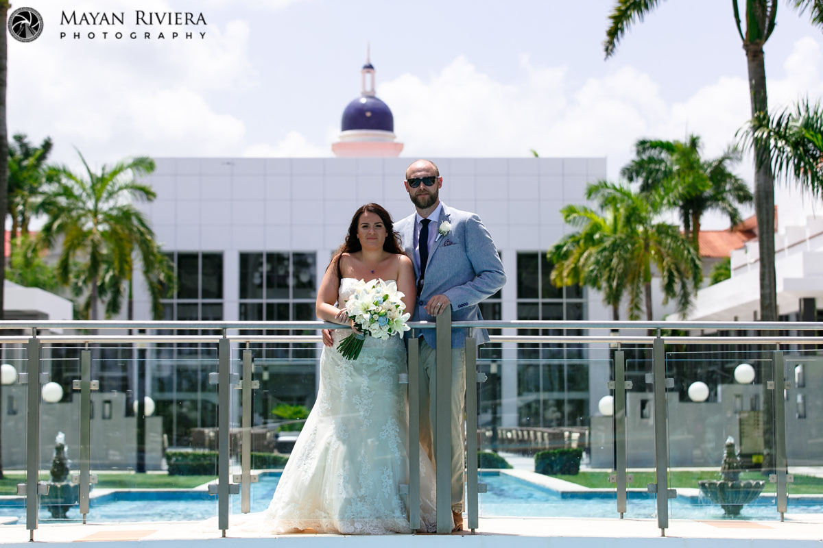 NewlwedsPoseByPool