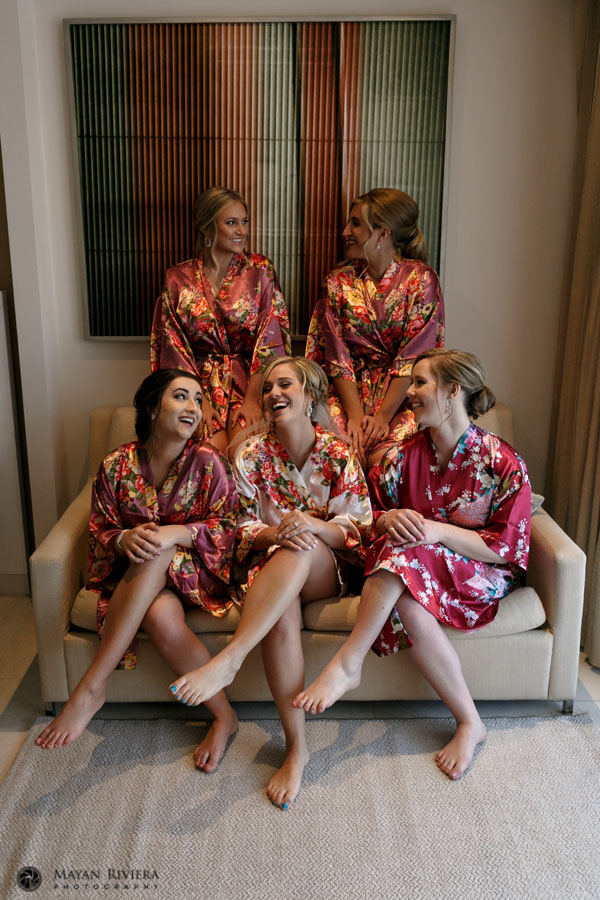 BridalPartyLaughingOnSofa