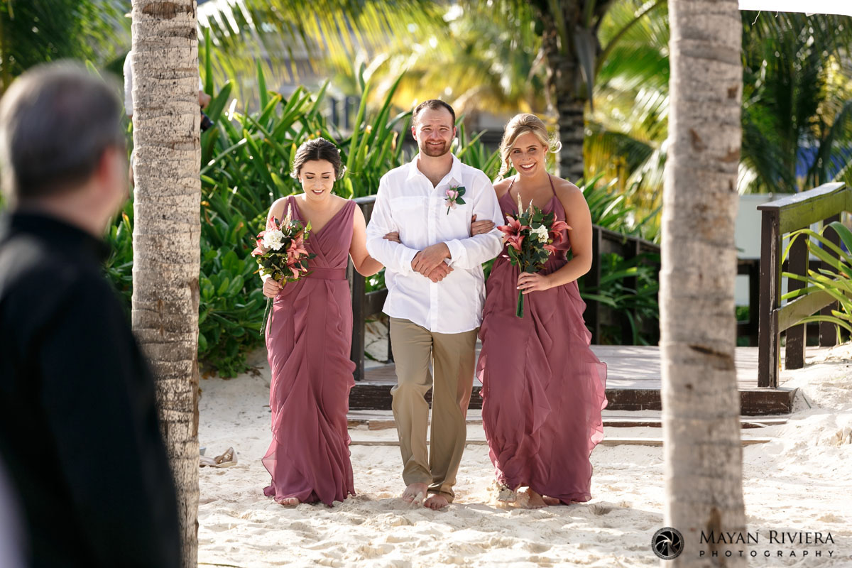 GroomsmanWalksInWithTwoBridesmaids