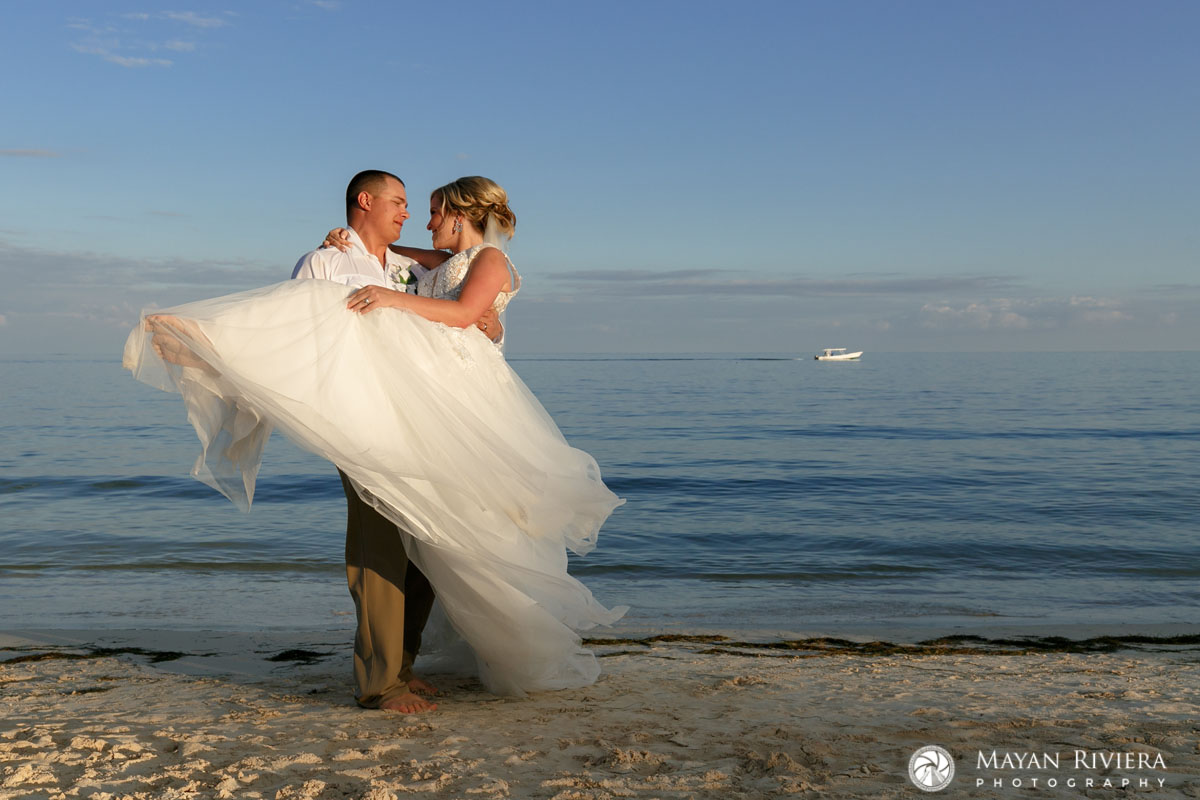 NewlywedsTwirlOnBeach