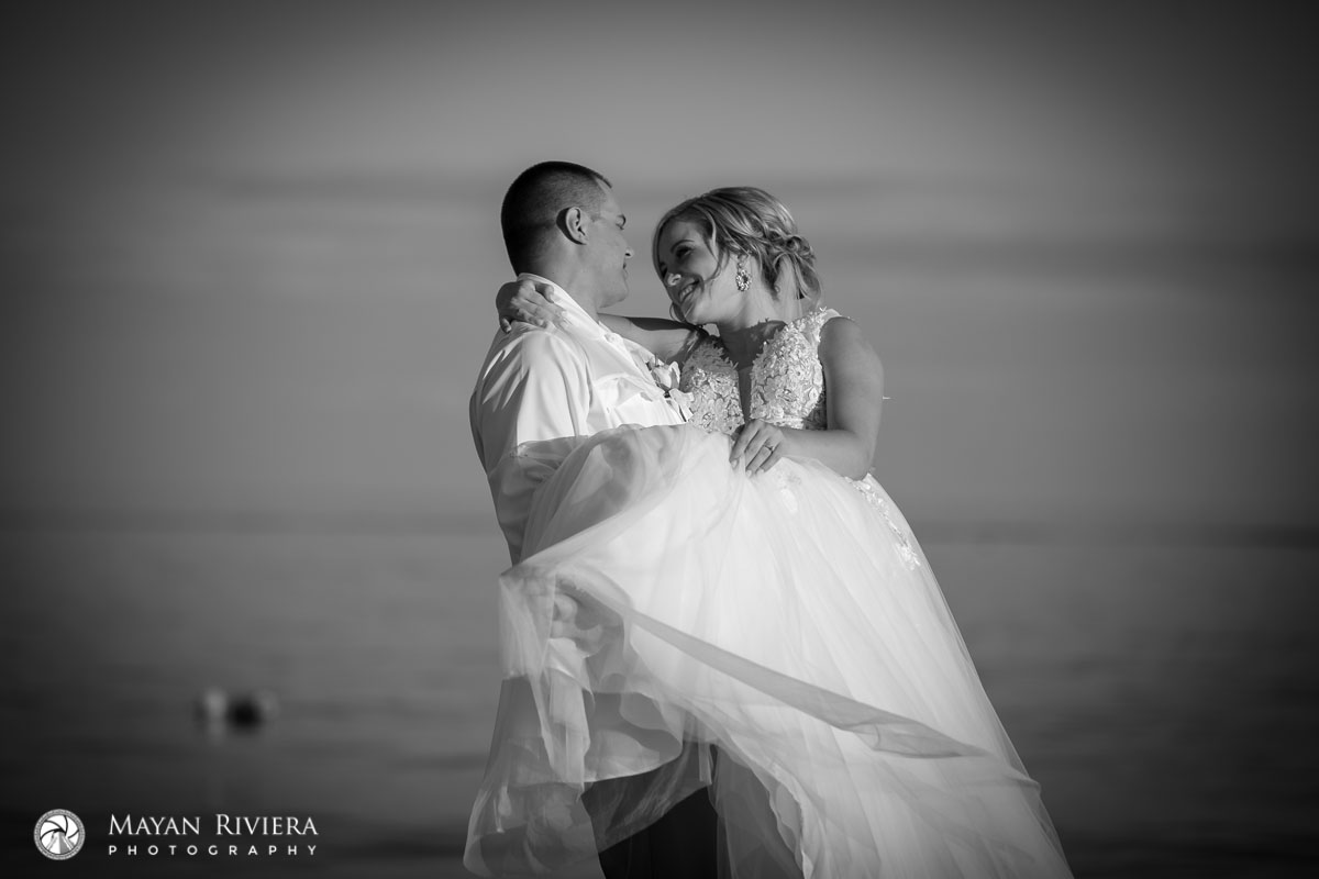 NewlywedsTwirlOnBeach
