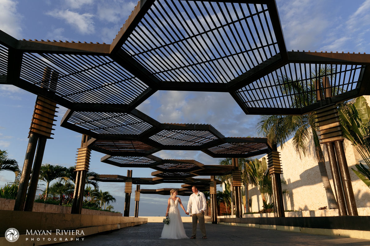 NewlywedsPoseUnderRoyaltonDrivewayRoof