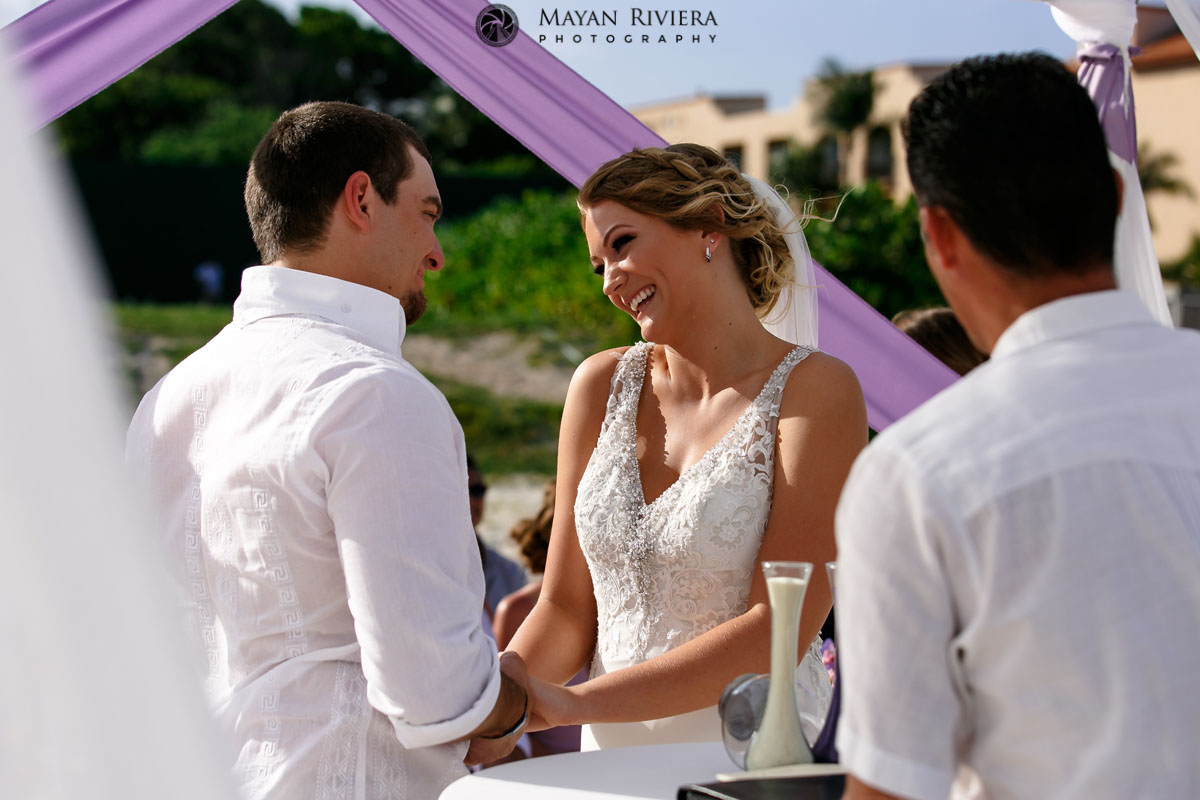 BrideAndGroomSmilingAtEachOther