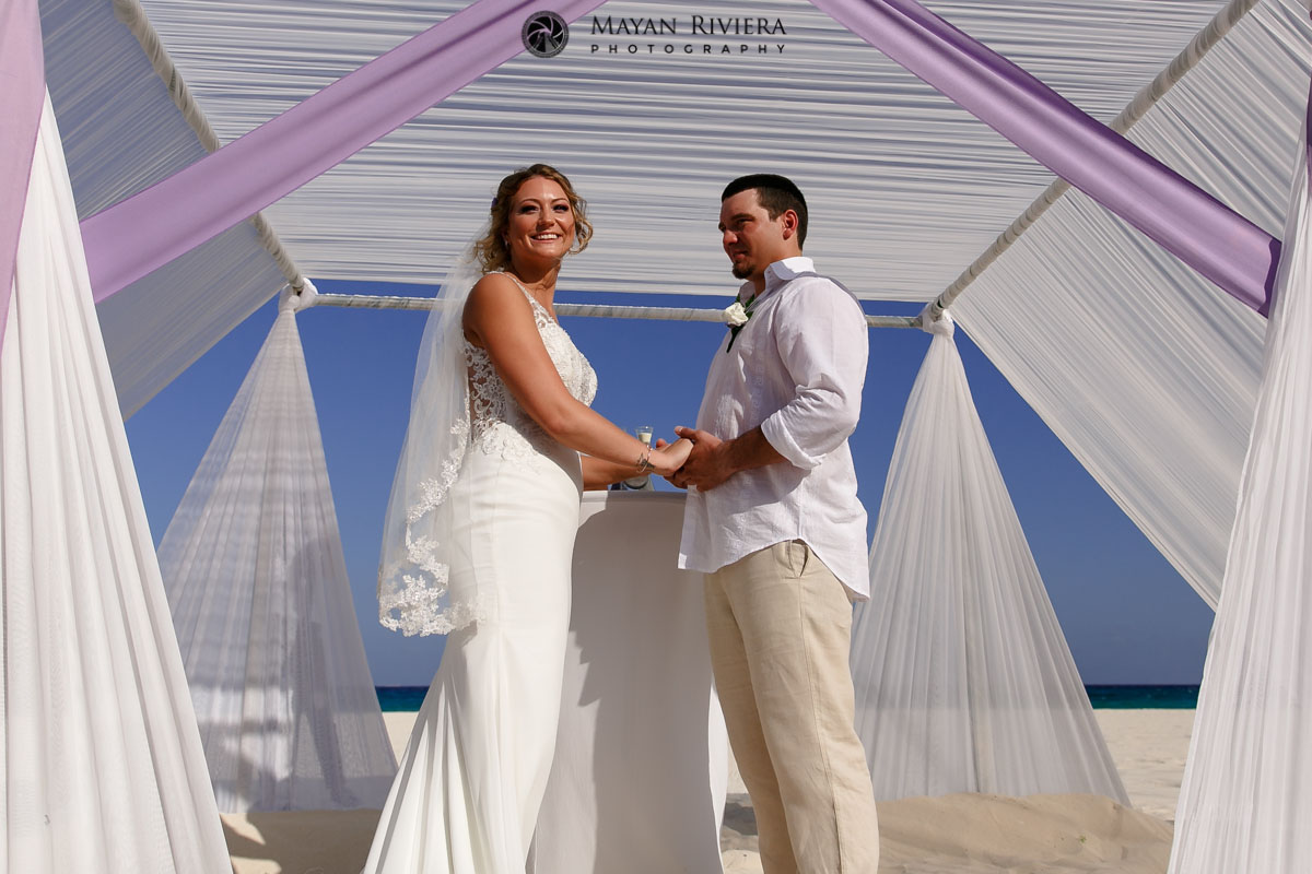 BrideAndGroomHoldingHands