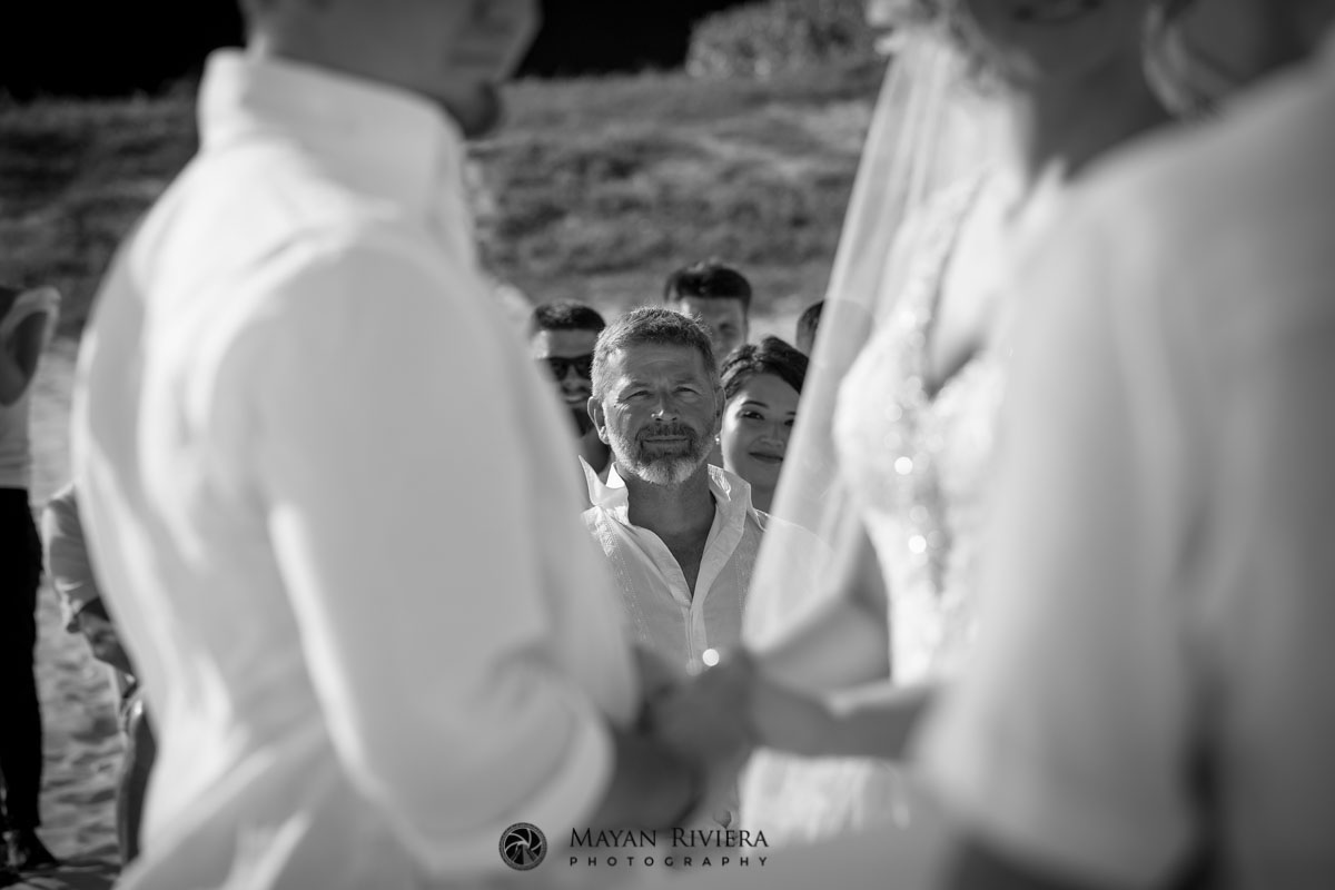 BrideAndGroomHoldingHands
