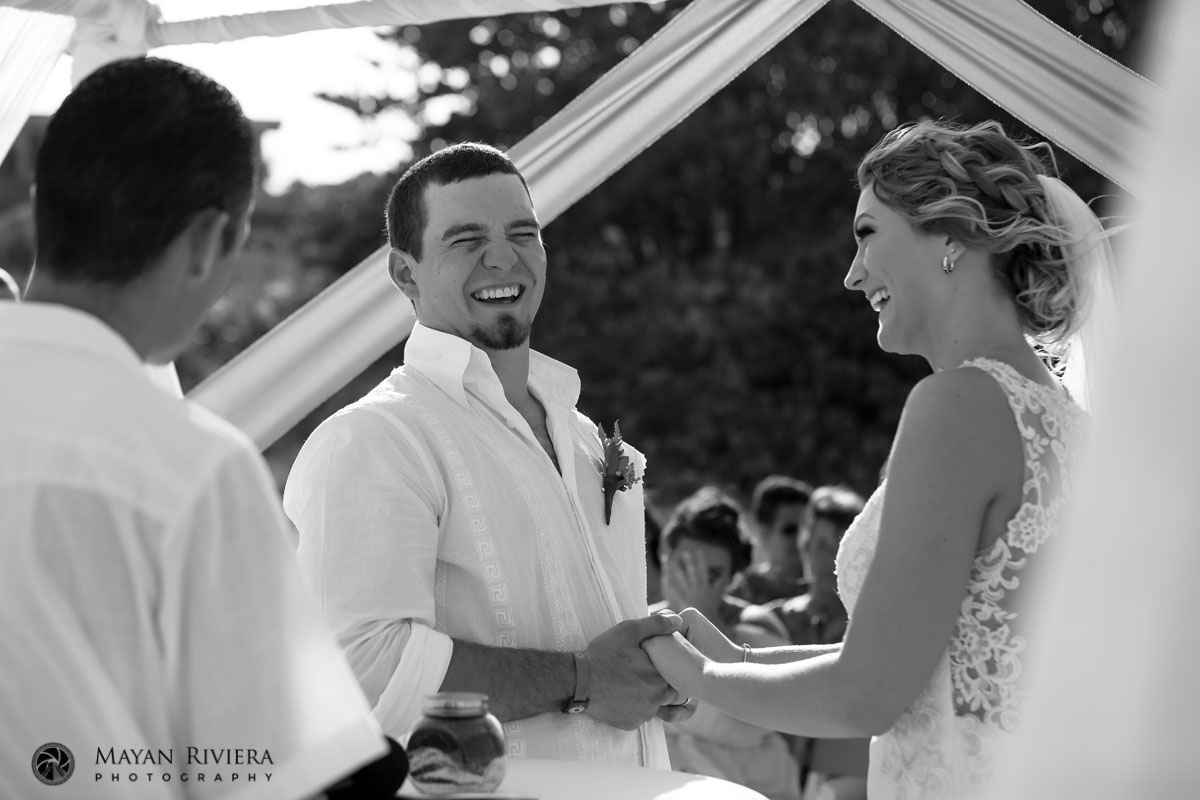 LaughingBrideAndGroomHoldingHands