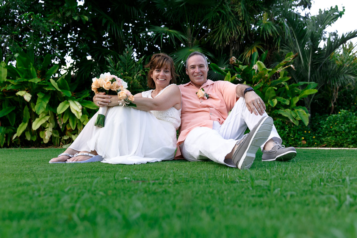 SmilingAnniversaryCoupleSittingOnGrass