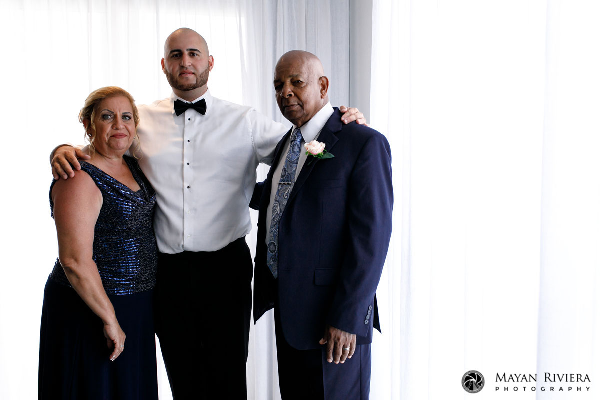 GroomPosesByWindowWithParents