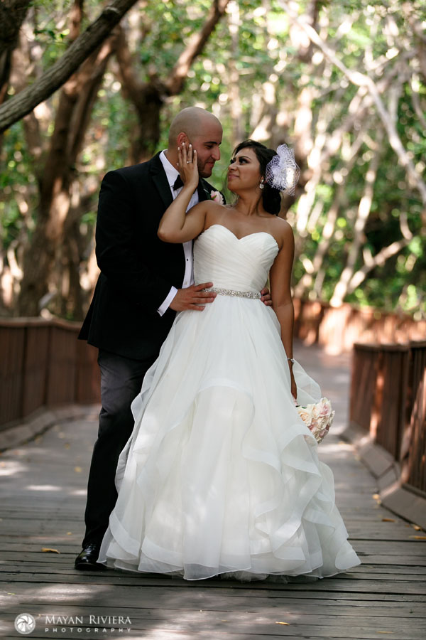 BrideHoldsGroomsFace