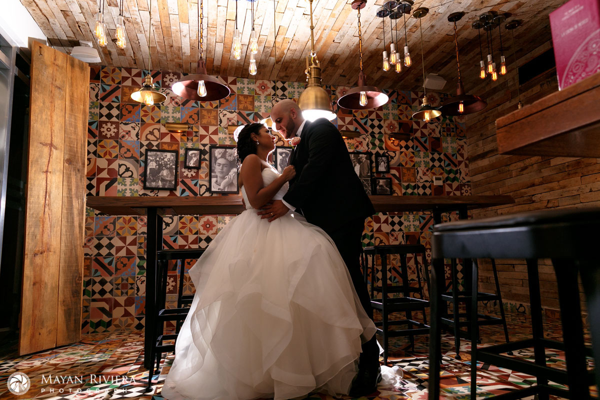 NewlywedsPoseInBar