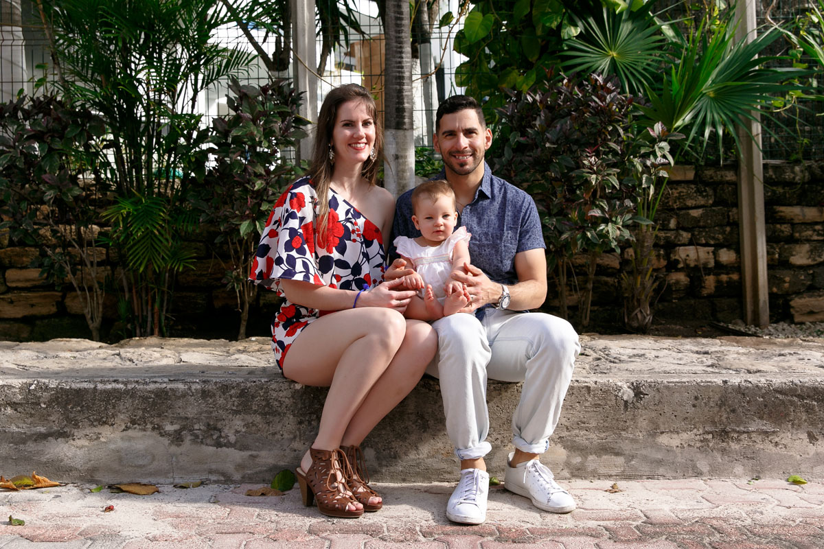 SmilingBabyOnParentsLaps